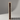 Wooden wine rack with six bottles of red wine on a gray background