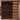 Wooden wine rack with bottles in a well-lit room